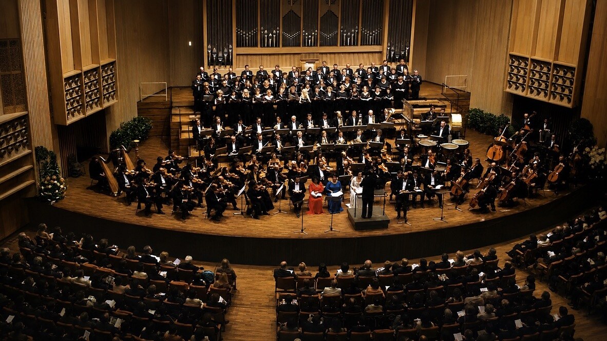 Anthony G. Morris at the far right among four horn players with the Bruckner-Orchester Linz at Brucknerhaus